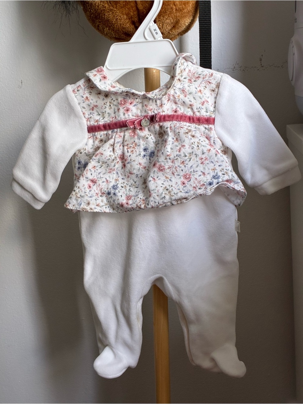 Newborn Girl Footed Romper with Floral Collar
